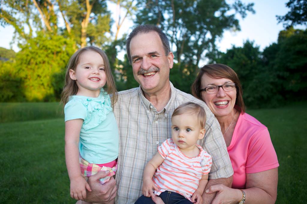 Dr. George Coleman with his wife and two of his granddaughters.